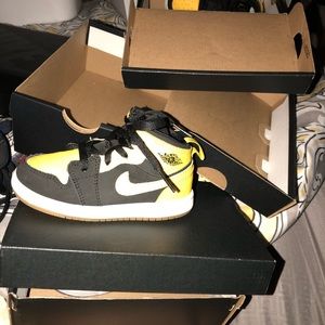 Yellow and black Nike’s